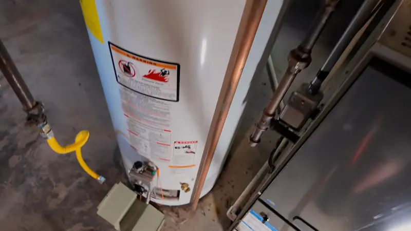 Gas water heater in a Chester basement that needs emergency hot water heater repair